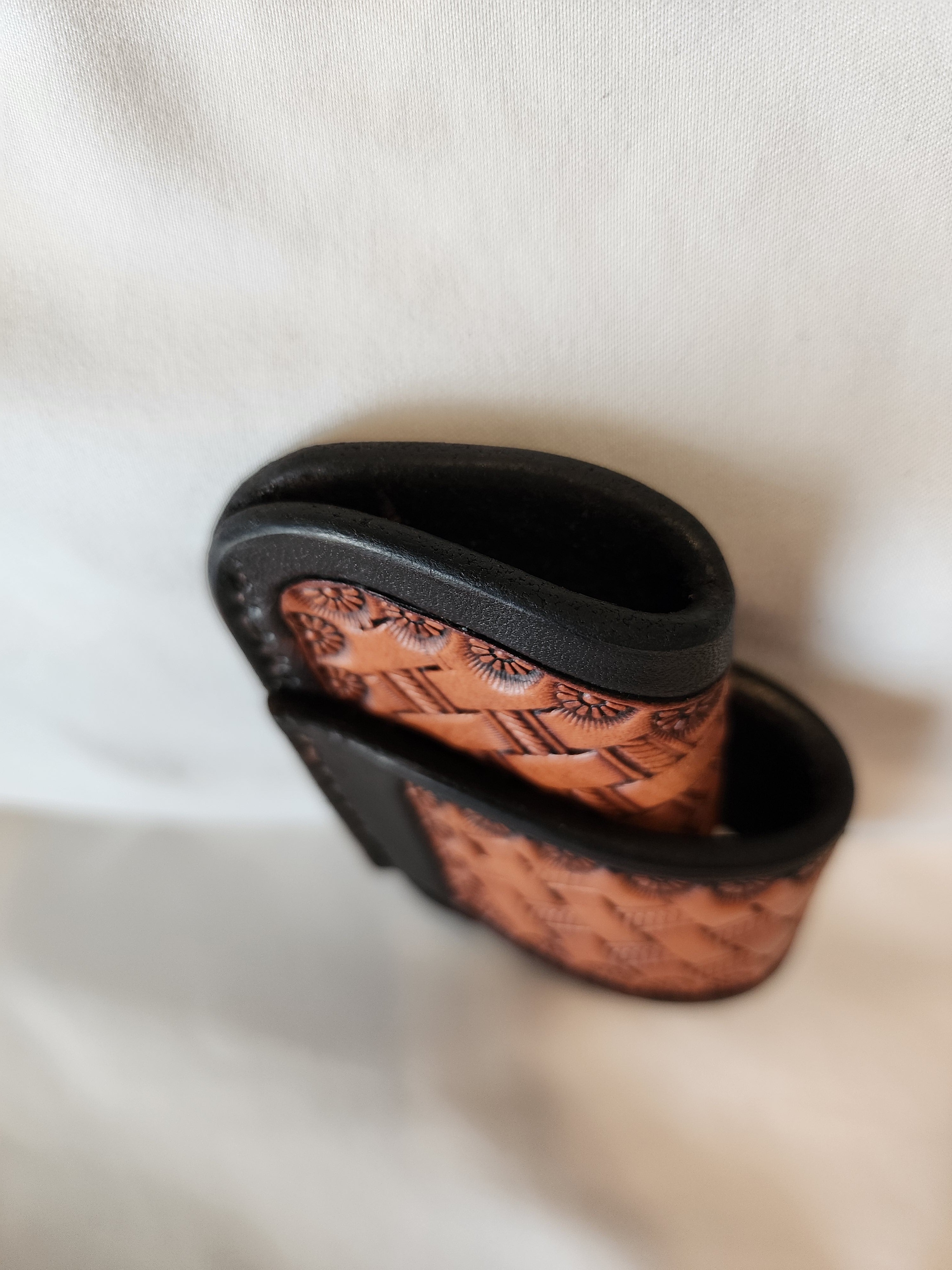 Handmade leather knife sheath with basketstamp tooling by Starlight Leather Co.