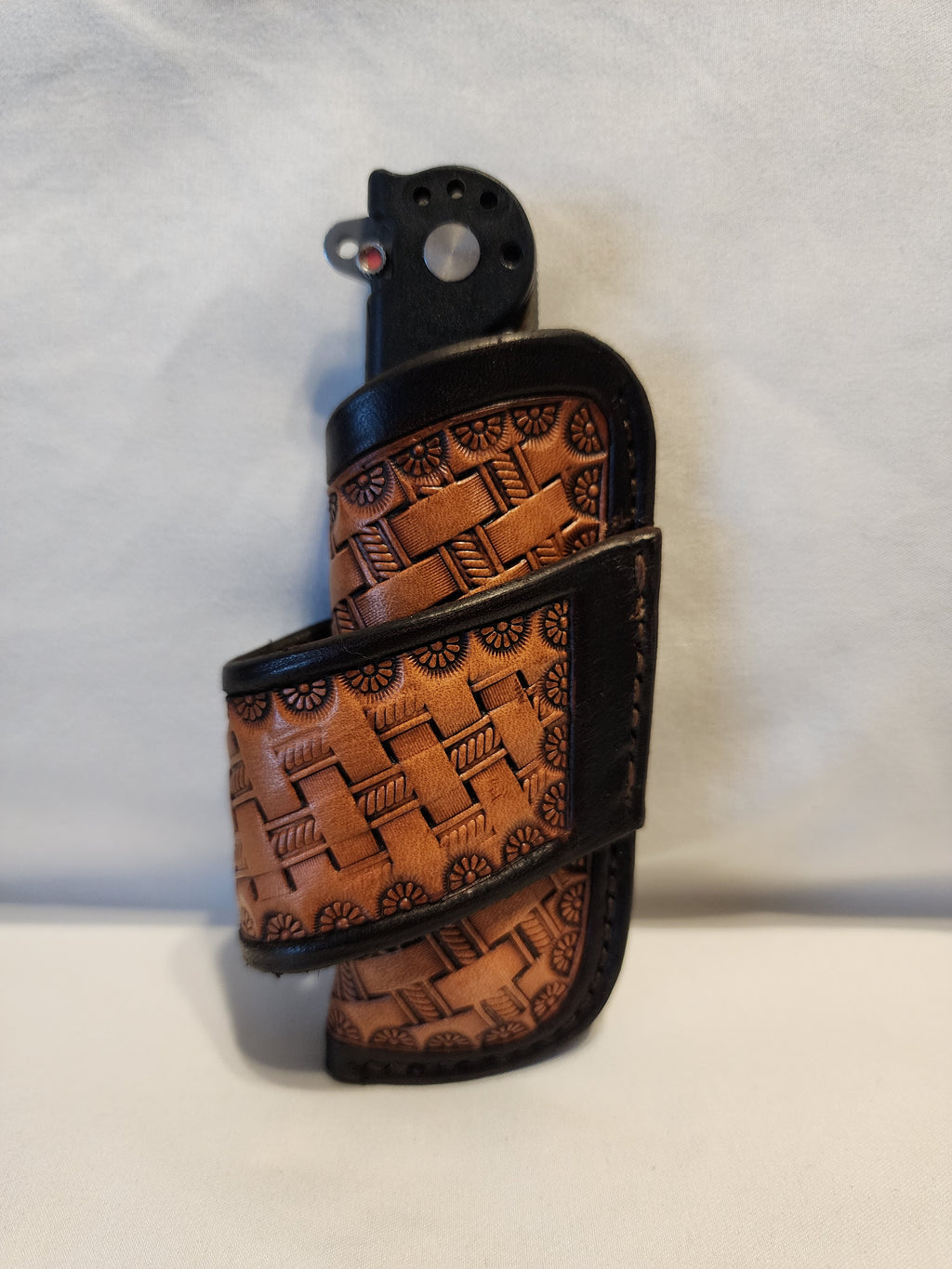 Handmade leather knife sheath with basketstamp tooling by Starlight Leather Co.