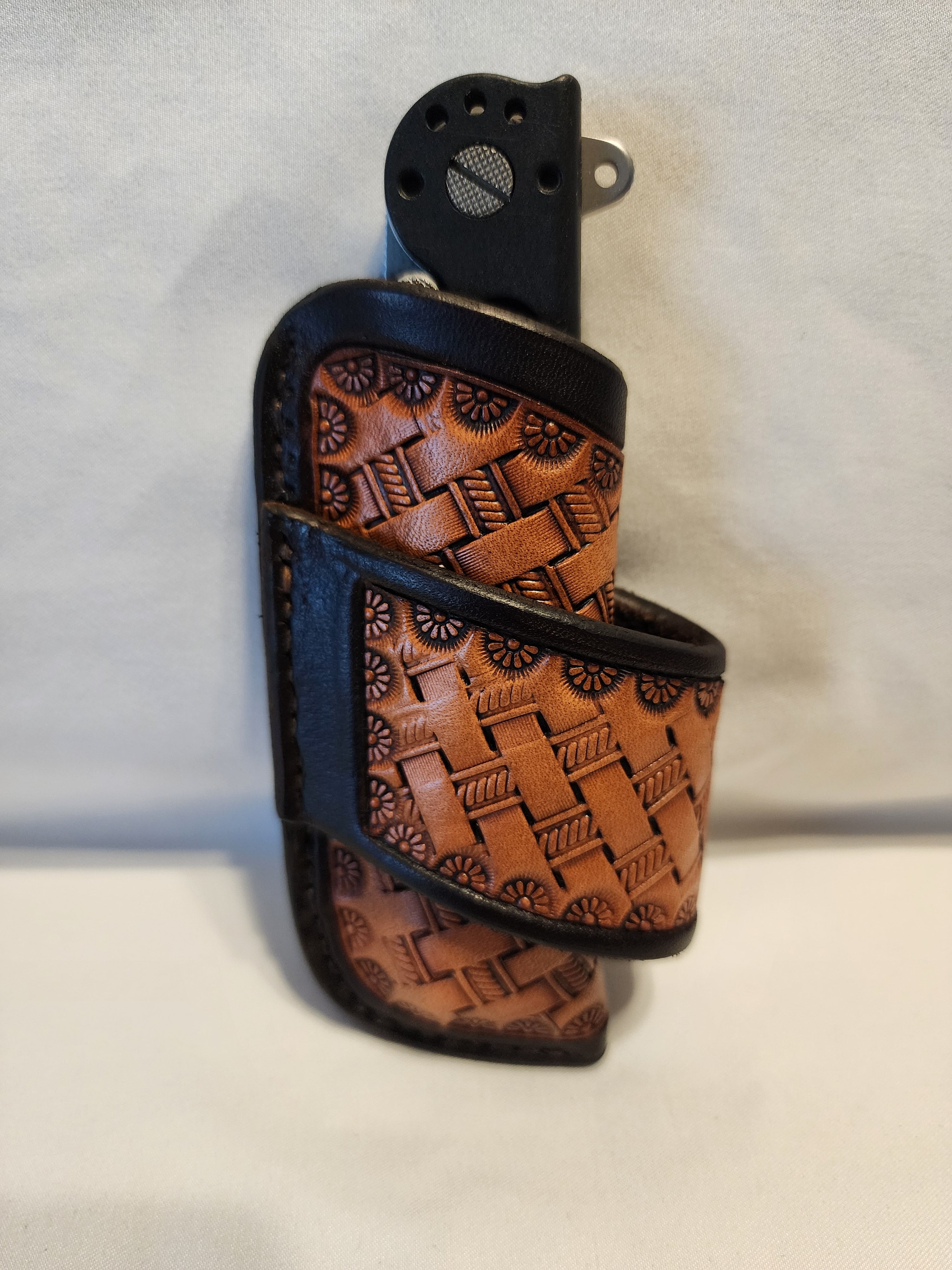 Handmade leather knife sheath with basketstamp tooling by Starlight Leather Co.