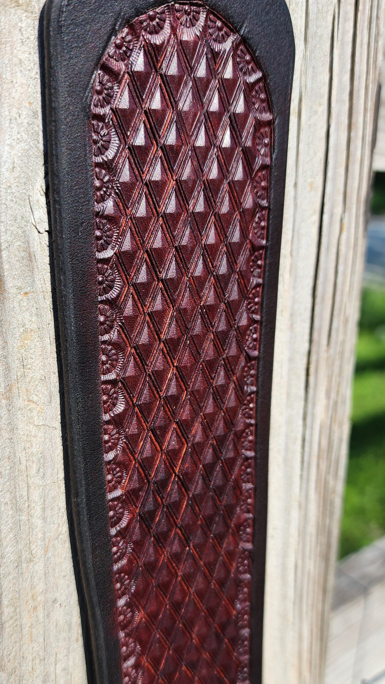 Handcrafted two-tone leather rifle sling with diamond stamping by Starlight Leather Co.