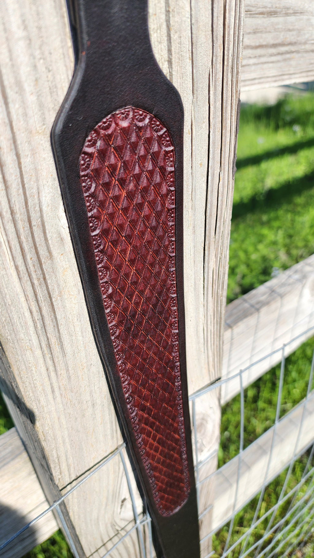 Handcrafted two-tone leather rifle sling with diamond stamping by Starlight Leather Co.