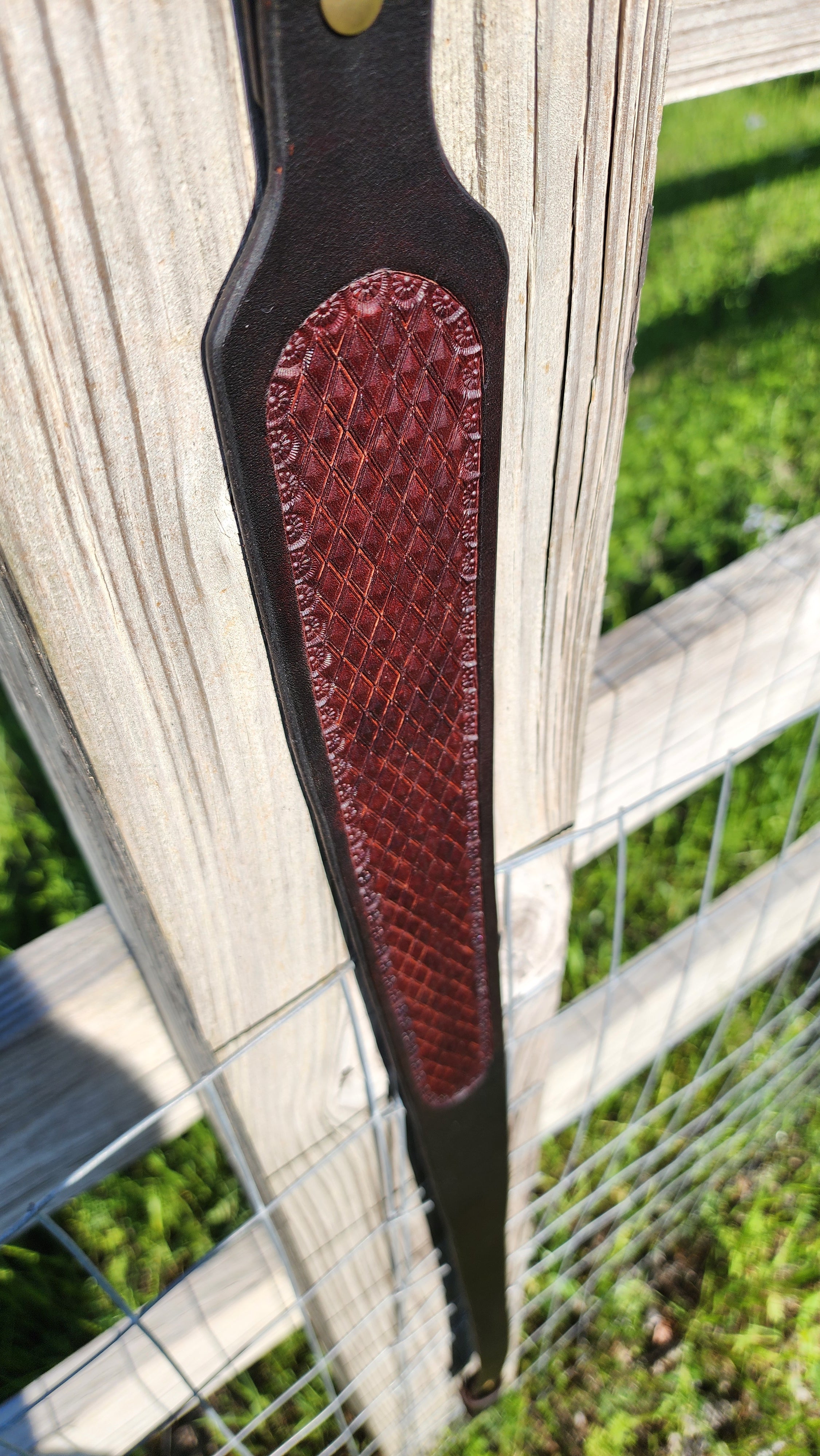 Handcrafted two-tone leather rifle sling with diamond stamping by Starlight Leather Co.