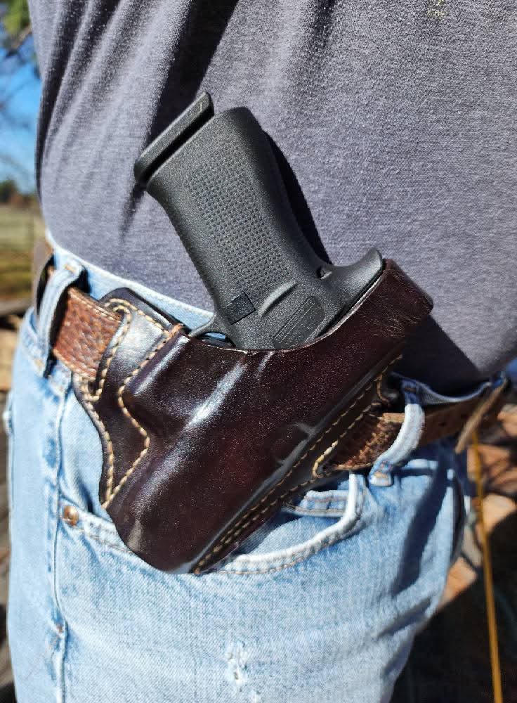 Brown handmade leather holster by Starlight Leather Co.